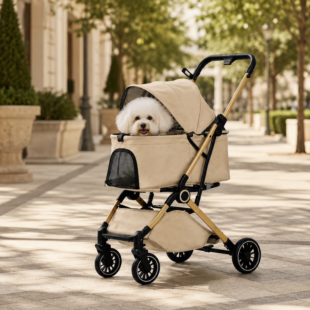 Small fluffy dog sitting comfortably in a khaki Promenade Luxe foldable pet stroller with mesh canopy in a bright outdoor setting.