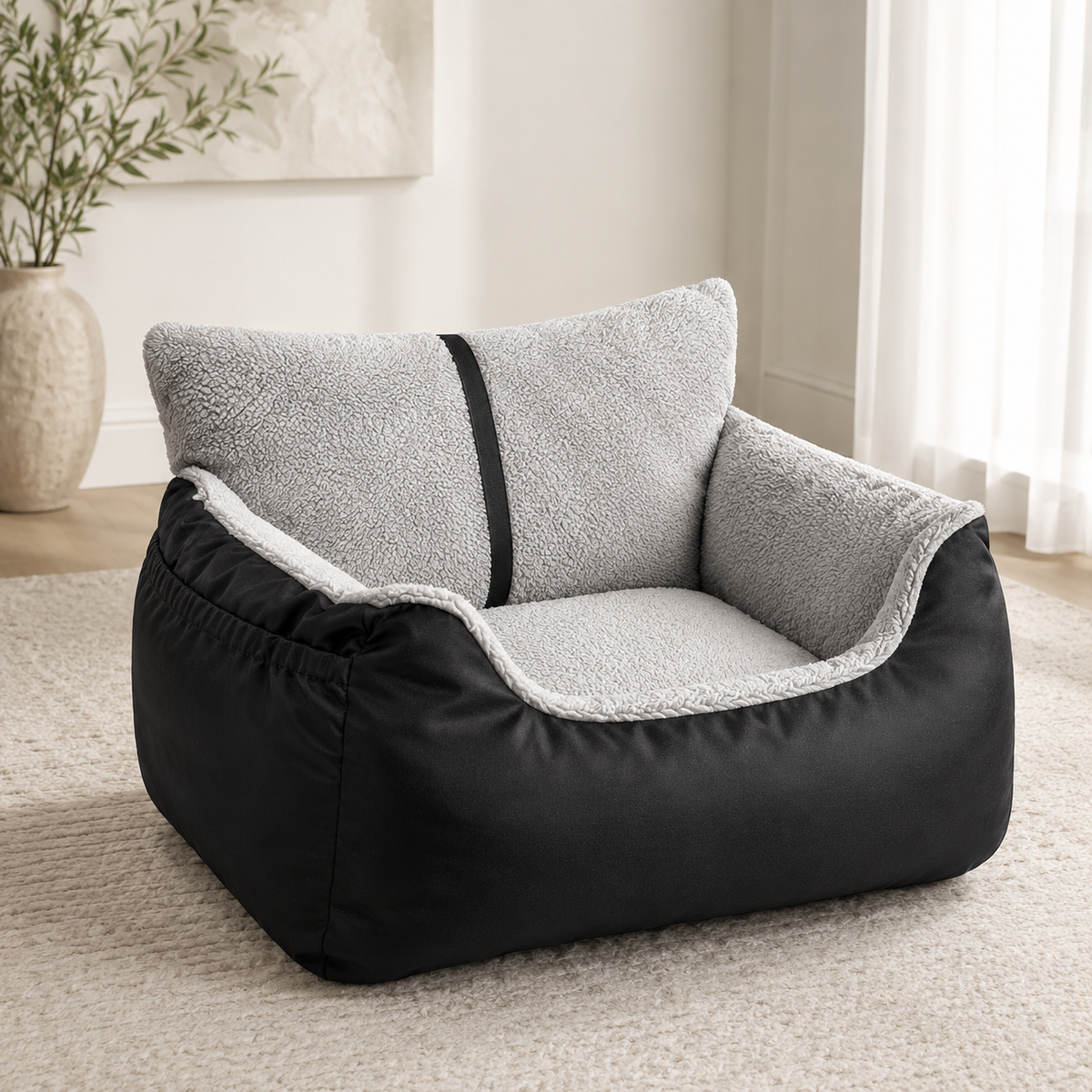 Black and grey detachable pet car seat bed with plush interior shown on a soft neutral home background.