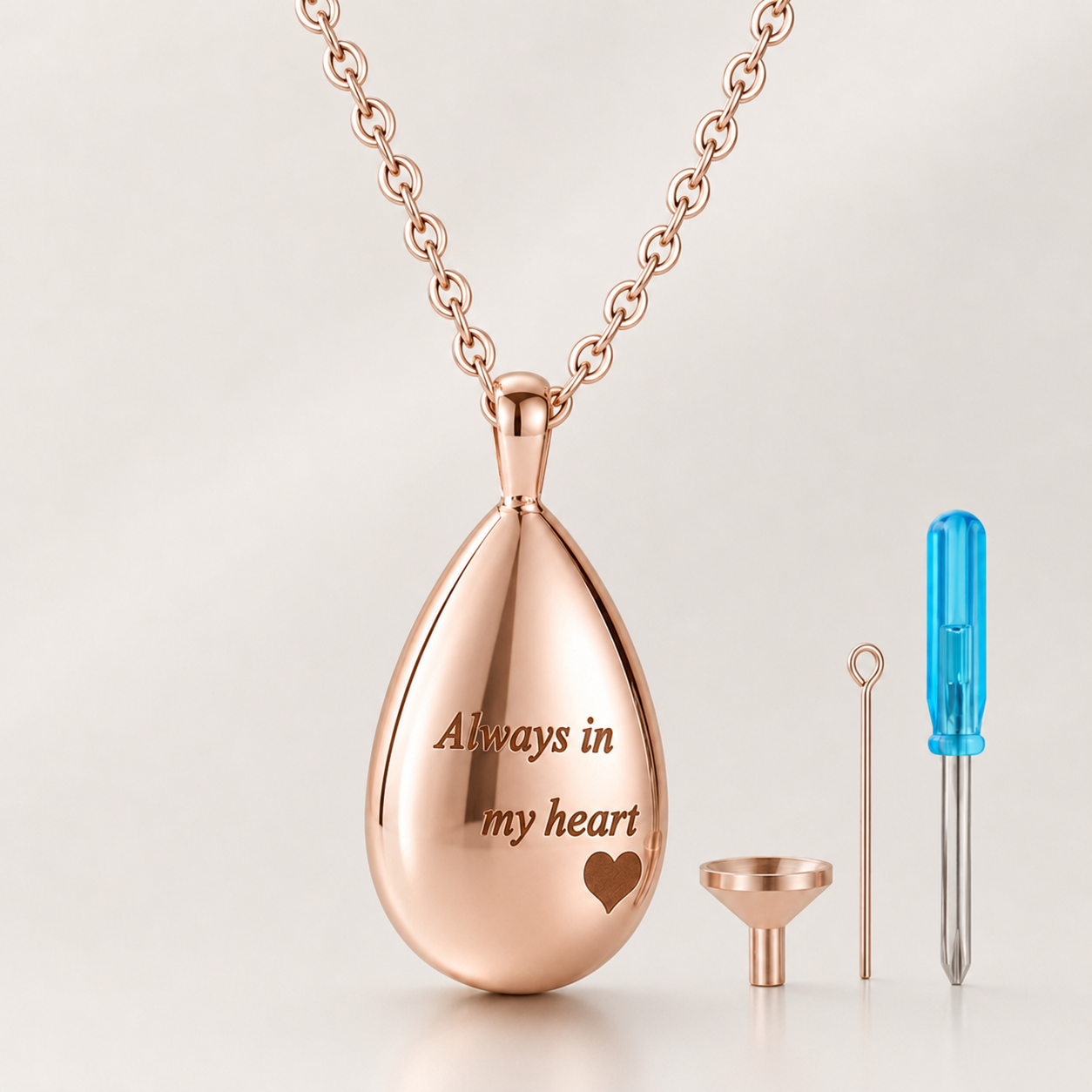 Rose gold memorial urn pendant necklace engraved “Always in my heart” with filling tools