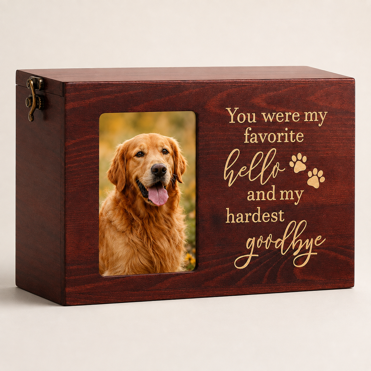 Red wooden pet memorial box with photo frame window and engraved quote on a clean studio background.