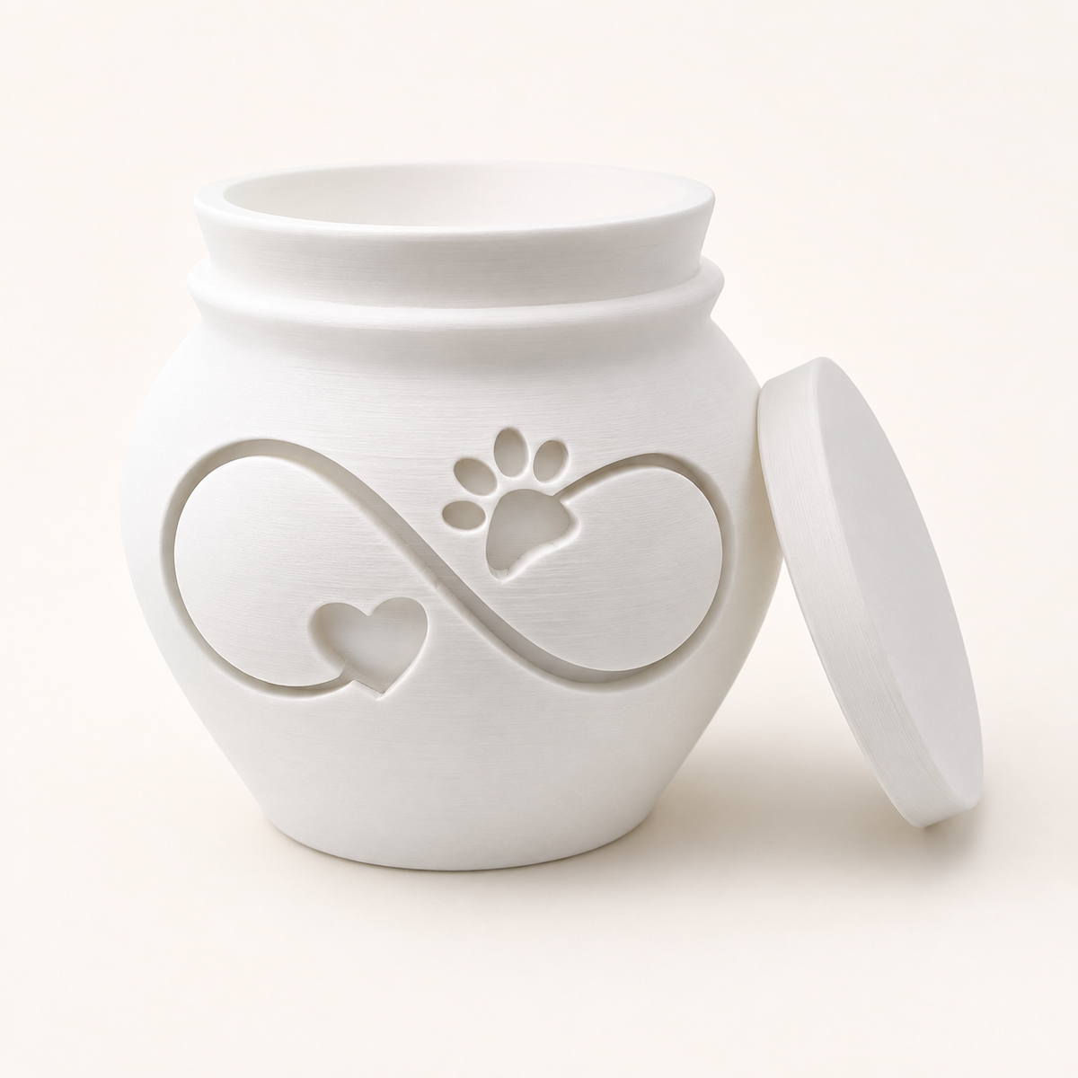 White 3D printed pet memorial urn with infinity symbol, heart, and paw print design, lid removed.