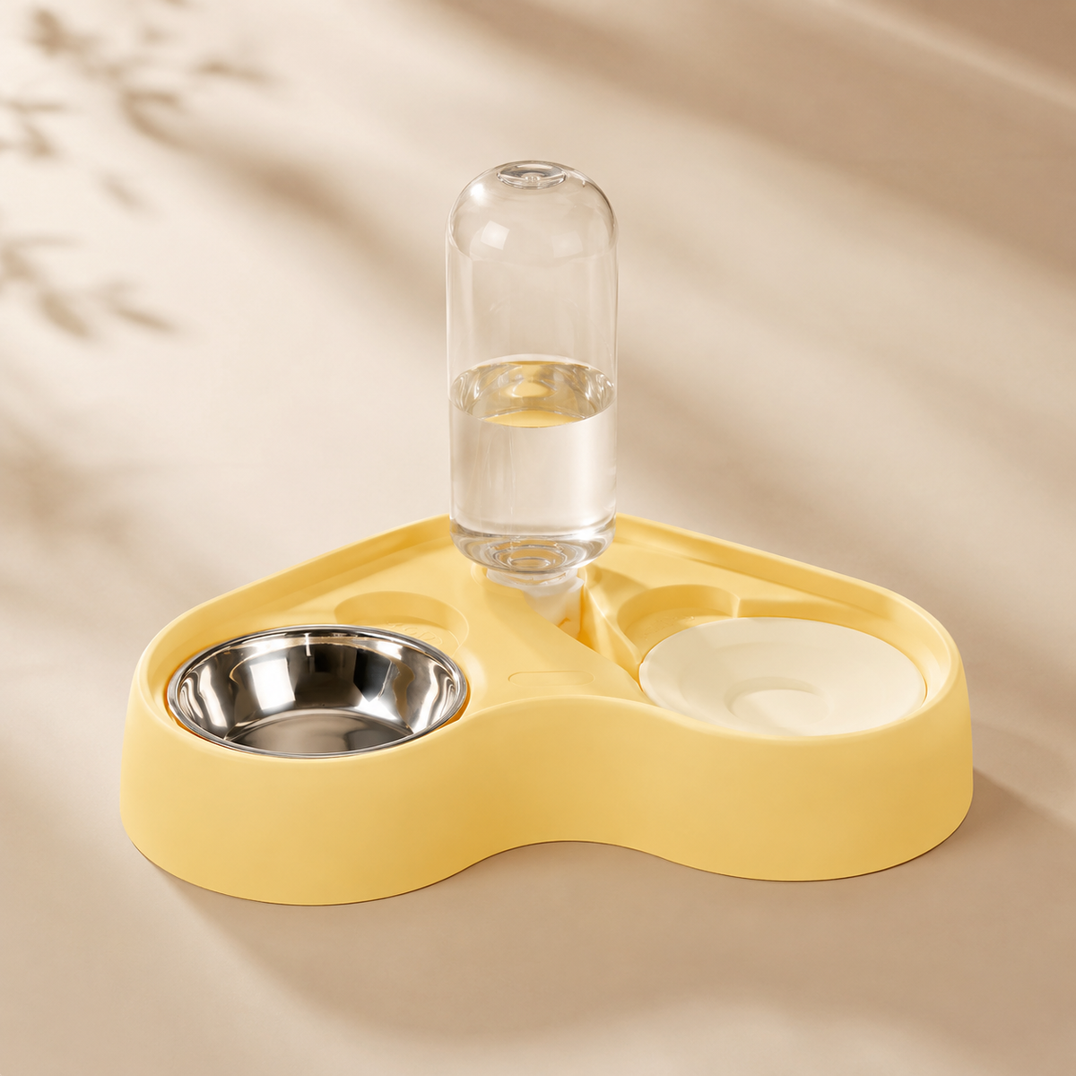 Maison Duo pet feeder and automatic waterer in Cream Yellow with removable stainless steel food bowl.