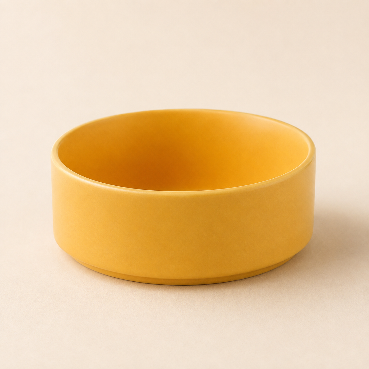 Yellow ceramic pet bowl without stand styled as a premium product-only image.