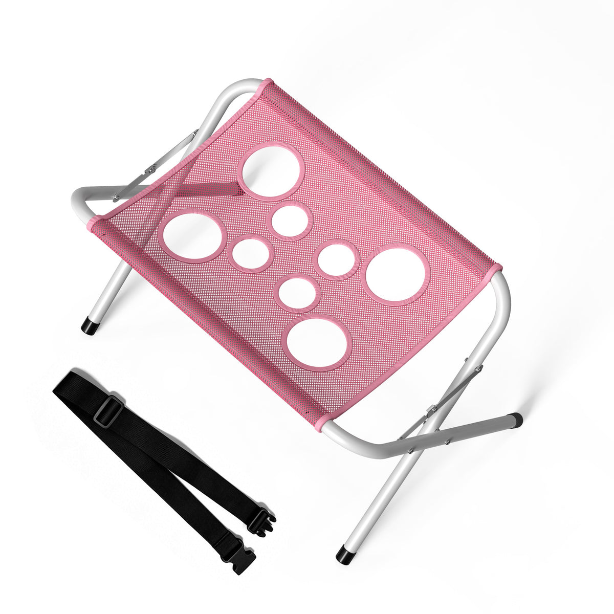 Pink grooming hammock on its white folding frame with the eight mesh openings visible, shown with the black adjustable strap alongside.