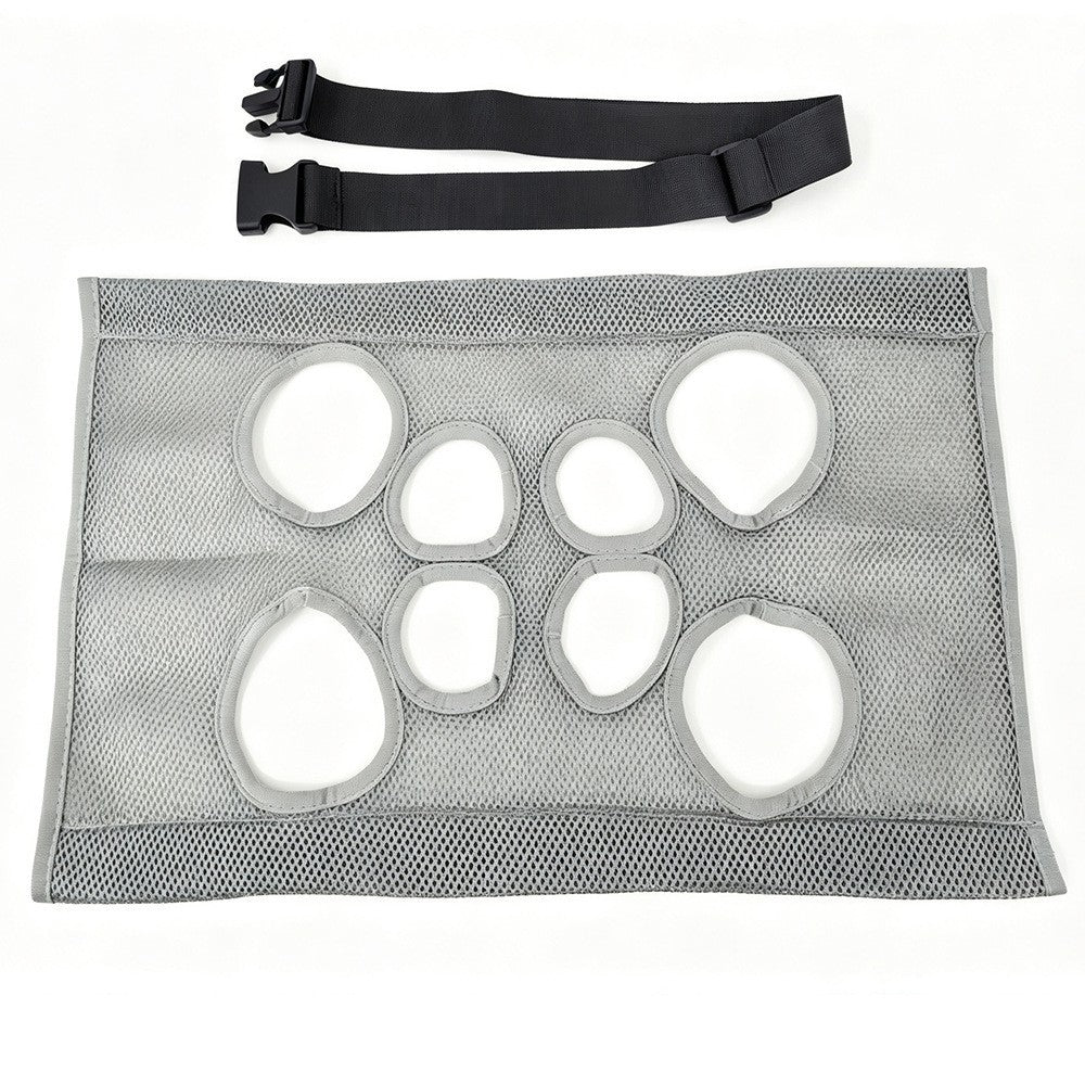 Gray mesh grooming sling laid flat, showing all eight openings, with the black adjustable strap above it. No frame is shown.