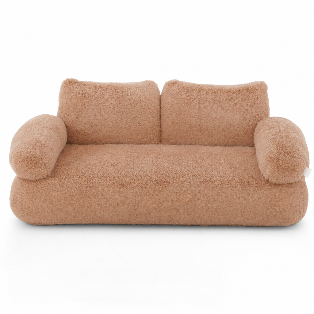 Apricot plush cat bed shaped like a small sofa, with a two-part backrest and two rounded armrests.