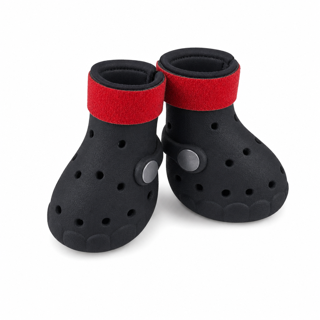 Two black EVA dog boots with red hook-and-loop straps and grey side studs.