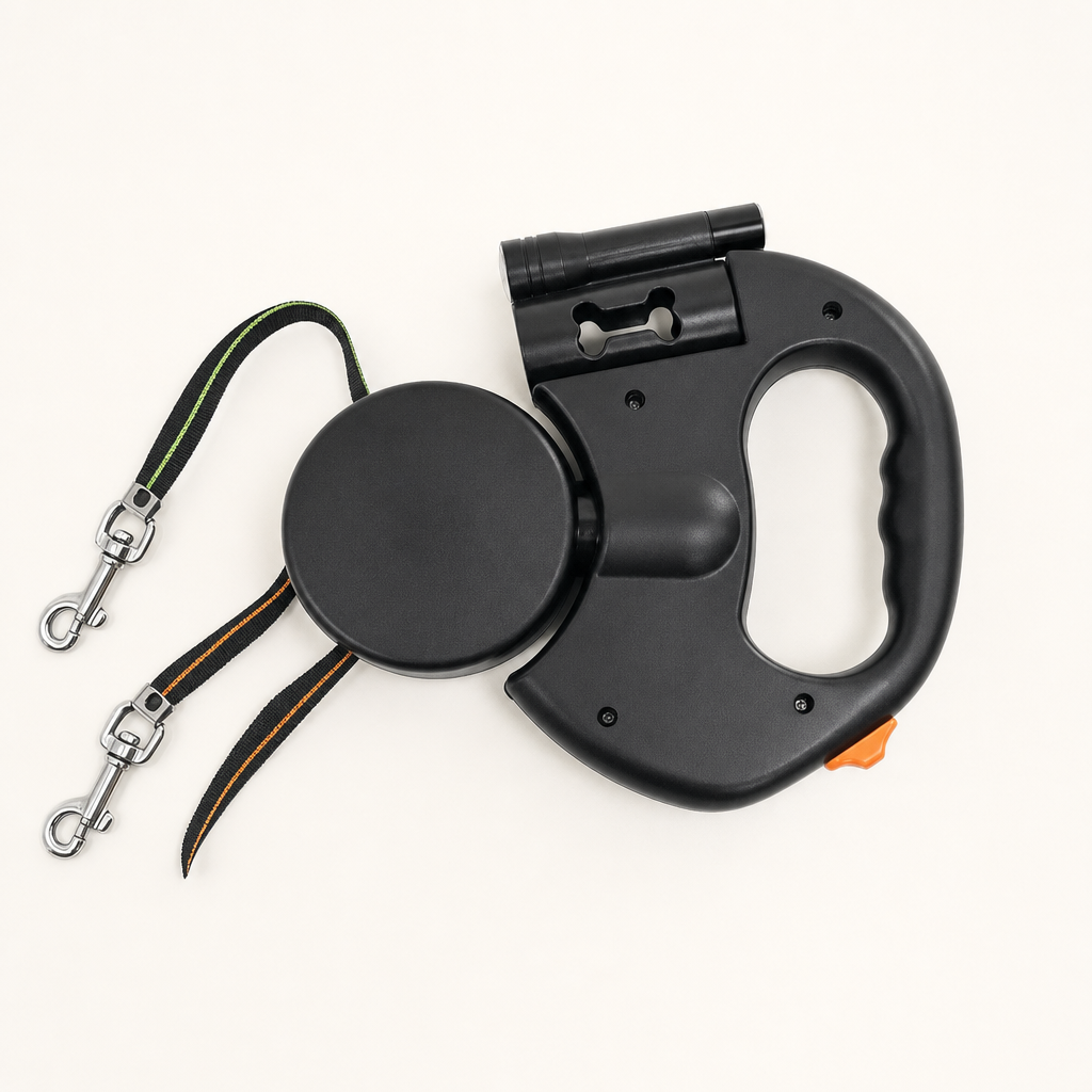 The dual retractable dog leash in Black, flat-lay from above, with both tapes and both chrome snap hooks extended.