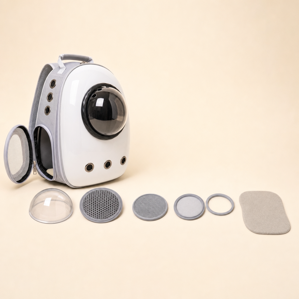 The carrier shown beside its interchangeable dome covers, retaining ring and felt pad.