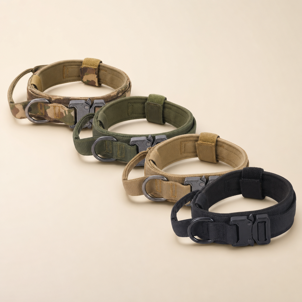 Four padded tactical dog collars in camo, olive, khaki and black, each with a quick-release metal buckle and D-ring.