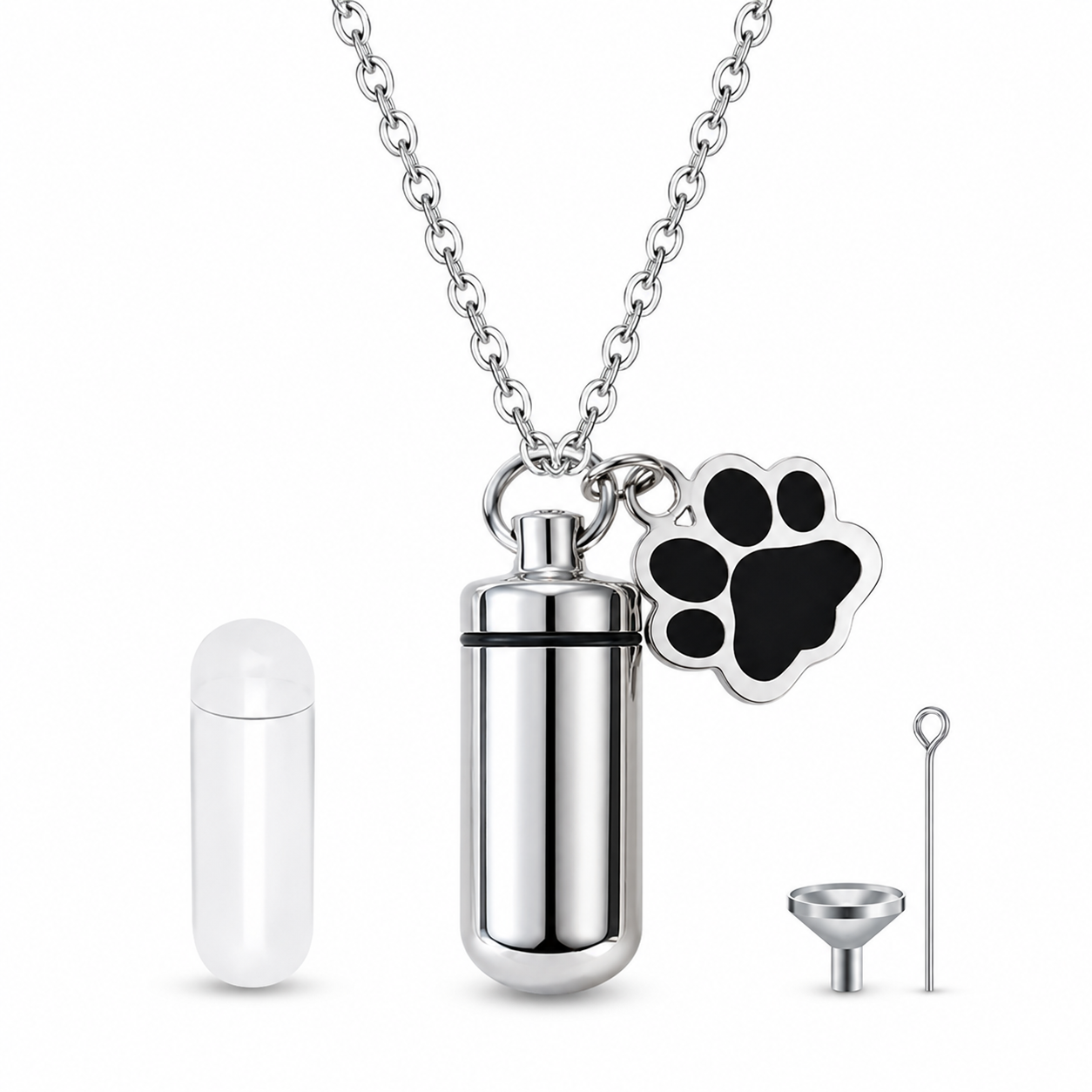 Silver stainless steel pet memorial keepsake necklace with black paw charm, capsule, funnel and filling pin.