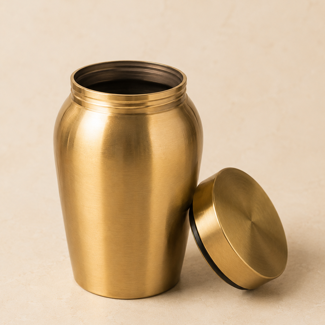 Open lid detail view of the stainless steel pet memorial urn showing the urn body and fitted lid.