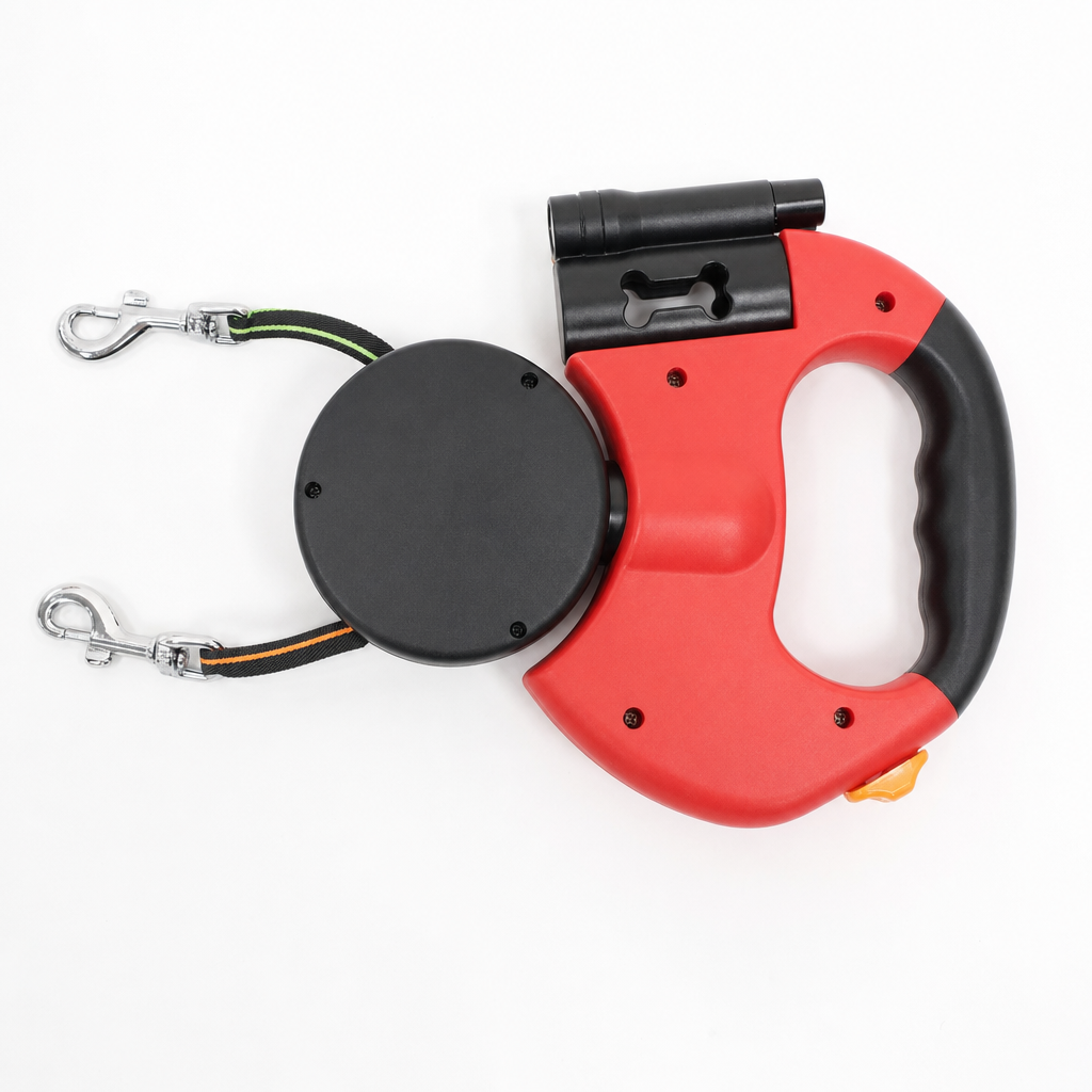 The dual retractable dog leash in Red, flat-lay from above, with both tapes and both chrome snap hooks extended.